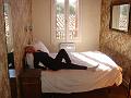 Bob and Vanilla's Esperaza flat - Christy sprawled on the 3rd floor bed